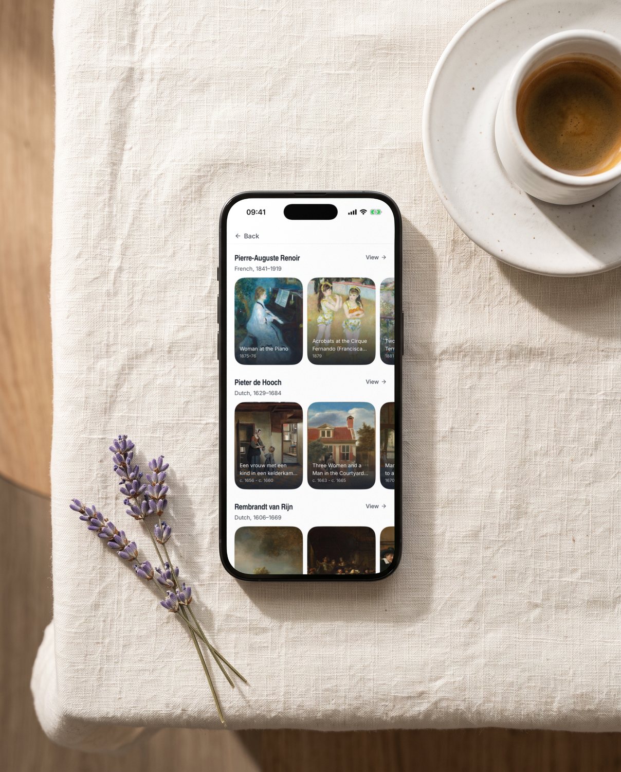 An iPhone on a linen tablecloth beside an espresso, showing YEUX's list of artists, with Pieter de Hooch.